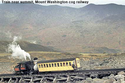 Train near summit ascending Mount Washington cog railway, NH, USA
