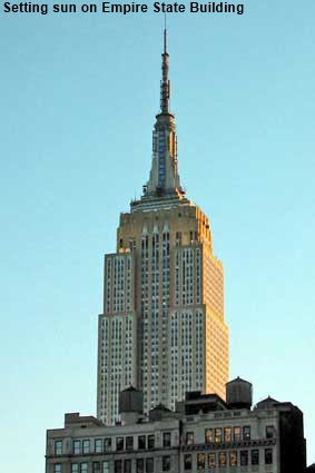  Setting sun on Empire State Building from Avenue of the Americas