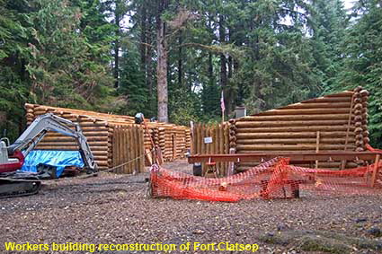 Workers building reconstruction of Fort Clatsop, near Astoria, OR, USA