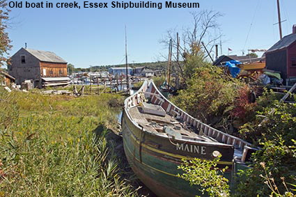 Old boat in creek, Essex Shipbuilding Museum, Essex, MA, USA